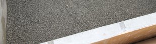 05: Schotter/Kies einfüllen Schicht mit Schotter und Kies